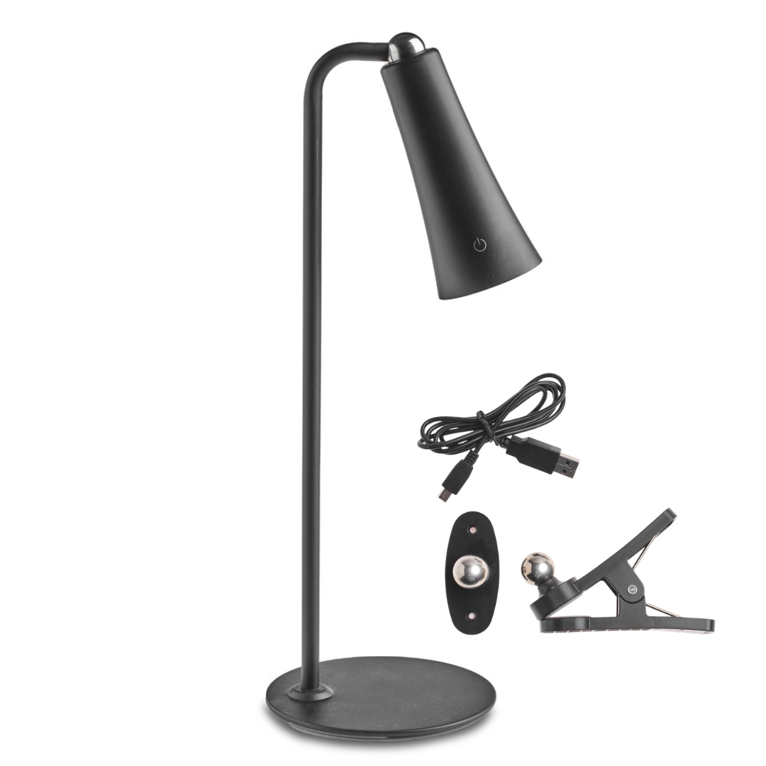 Portabel svart LED-bordslampa med uppladdningsbart batteri och varmvit belysning för mysig kvällsstämning.